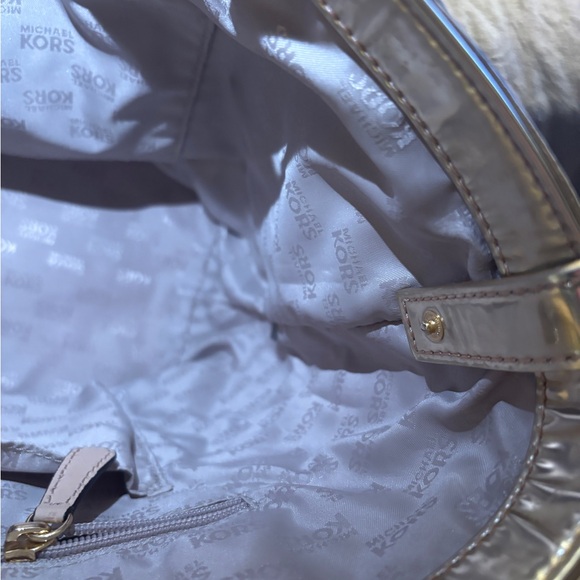 Michael Kors Women's Gold Metallic XL Tote Bag .
16” W x 11” T x 6.5” D - Picture 13 of 16